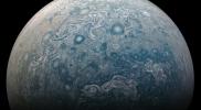 NASA's Juno spacecraft captured this view of a chaotic, stormy area of the planet's northern hemisphere known as a folded filamentary region.