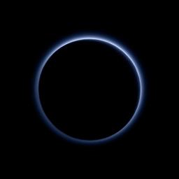 Pluto's haze layer shows its blue color in this picture taken by NASA's New Horizons. The high-altitude haze is thought to be similar in nature to that seen at Saturn's moon Titan.